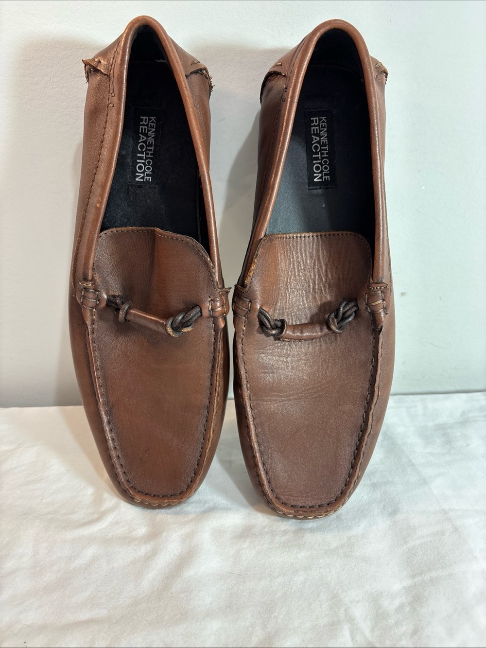 Kenneth Cole Reaction Men's Brown Leather Slip-On Loafers with Knot Detail. 9/3